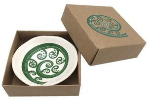 Green Fern Frond On White Dish