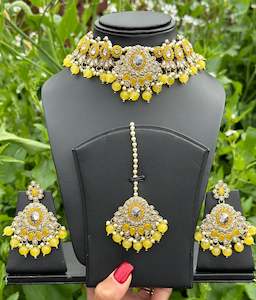 Yellow Colour Jewellery Options: Yellow Choker / Necklace set with pearls & beads in reverse AD ( high quality polki )