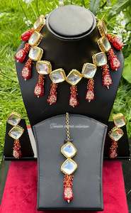 Maroon Colour Jewellery: Maroon choker / necklace set in uncut Kundan with tumbler beads