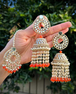 C Orange Colour Jewellery Options: Orange pearl drop Jhumka earrings and tikka set in mirror