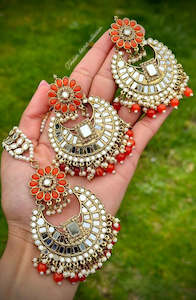 Orange Earrings and Tikka set in mirror