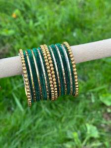 Green velvet bangles set with golden beaded kangan’s