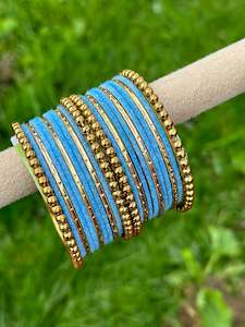C Sky Blue Colour Jewellery Options: Baby Blue velvet bangles set with golden beaded kangan’s