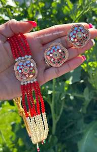 Red choker / necklace set with studs in mirror