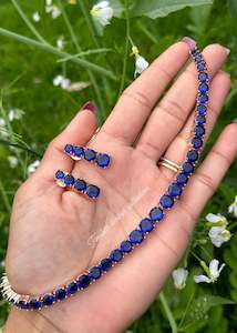 C Blue Colour Jewellery Options: Blue American diamond necklace set in rose golden