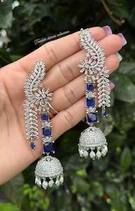 C Blue Colour Jewellery Options: Blue long American diamond Jhumka earrings in silver