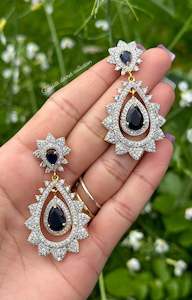 Blue American diamond earrings in golden