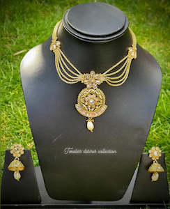 Gold plated Necklace set with jhumka earrings in Antique look