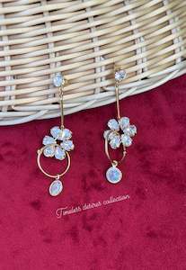 Golden hanging earrings in western style