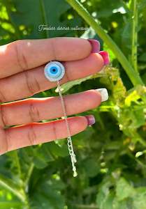 Evil eye adjustable size bracelet in American diamond on silver polish