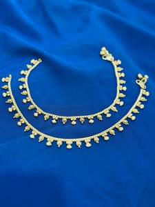 Anklets: Polki anklets in gold colour - (Code:062)