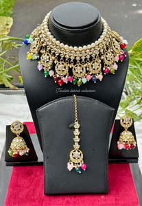 Multi colour necklace set with Jhumka earrings and tikka in kundan