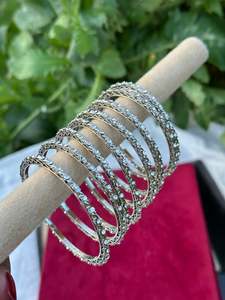 Silver Colour Jewellery Options: Sleek Kangan / bangles in silver ( set of 8 )