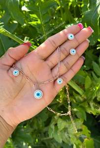 American Diamond: Evil eye necklace set with studs in American diamond high quality rose gold colour