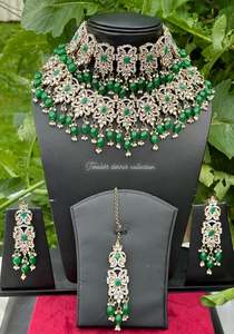 Green double layer choker / necklace set in Kundan