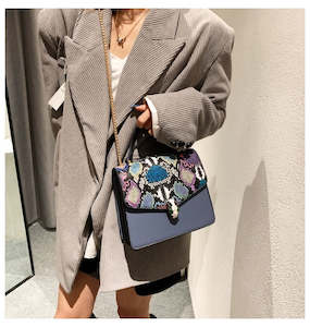 Embossed Snakeskin Vegan-Friendly Leather w Shimmer and Serpent Head Closure Cro&hellip;