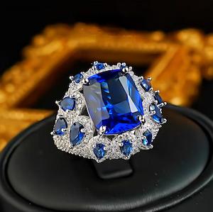 Celestial Sapphire Halo: 8Carat Cubic Zirconia Ring, 18k White Gold
