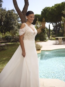 Products: Joy by Modeca Curves To Cherish Bridal Boutique