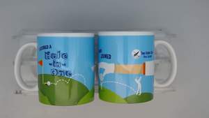 Merchandise: Two Under Club “Hole in One” Coffee Mug