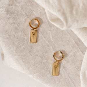 Earrings: Tino Huggies