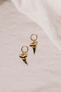 Earrings: Niho Huggies