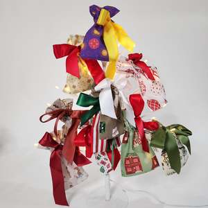 Ten tiny reusable gift bags