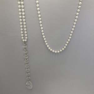 Accessories: Pearl strand with diamante ends
