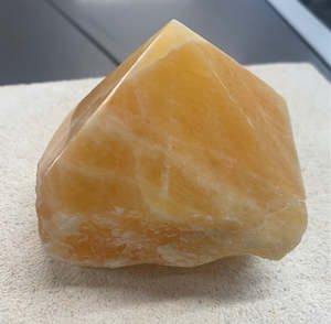 Candles Crystals: Orange Calcite Point Part Polished
