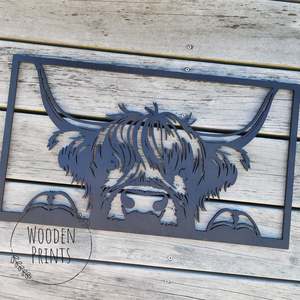 Peeking Highland Cow