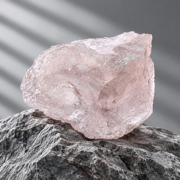 Raw Rose Quartz on white led light
