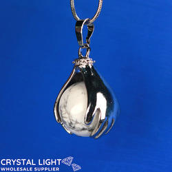 Hand and Howlite Sphere Pendant