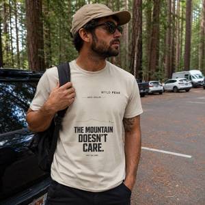New Arrivals Outdoor Streetwear: The Mountain Doesn’t Care Tee - Minimal Alpine Philosophy T-Shirt