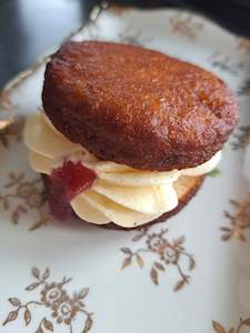 Donuts: Cream Filled Donut w Raspberry Jam