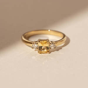 Rings: Orbit 0.72ct Emerald-cut Yellow Sapphire
