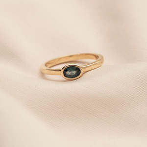 East-West 0.56ct Oval Blue Sapphire